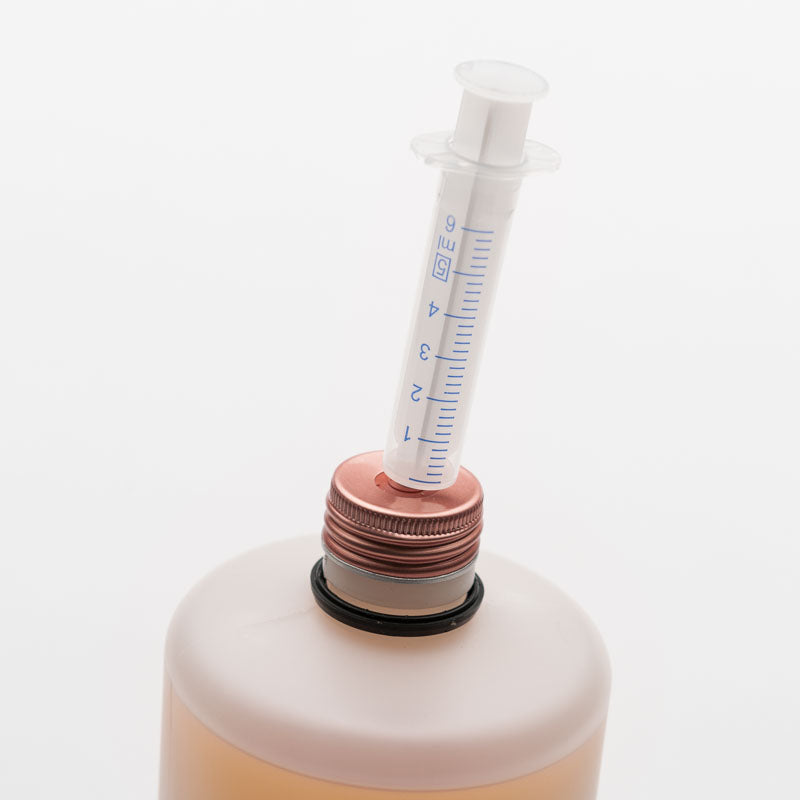 Dosierhilfe für flüssige Ergänzungsfuttermittel