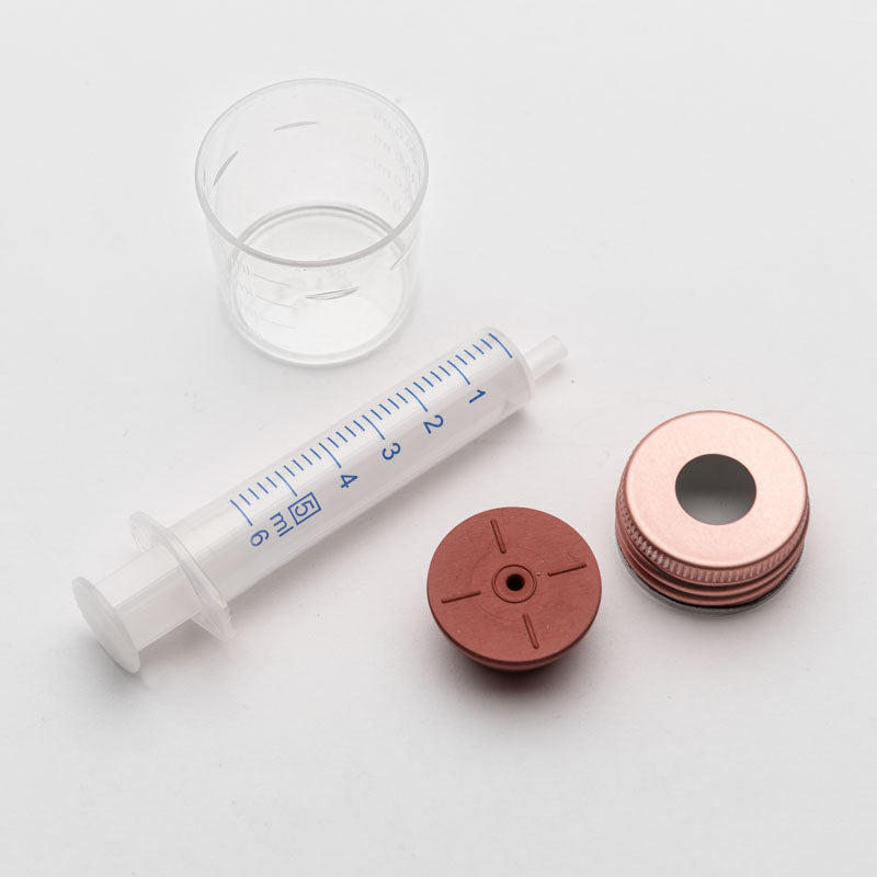 Dosierhilfe für flüssige Ergänzungsfuttermittel "Spritze, Dosierhilfe mit Skala, Gummistopfen mit Loch für die Dosierhilfe"